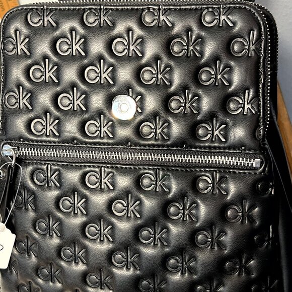Calvin Klein Women's Black Reyna Signature Embossed Key Item Flap Backpack - Picture 4 of 6